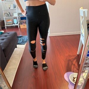 Sleek Black Ripped Women's Jeggings
